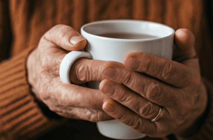 Hands holding tea